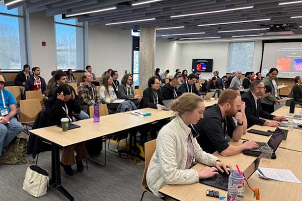 Attendees seated at tables during the FSU-ORNL Workshop 